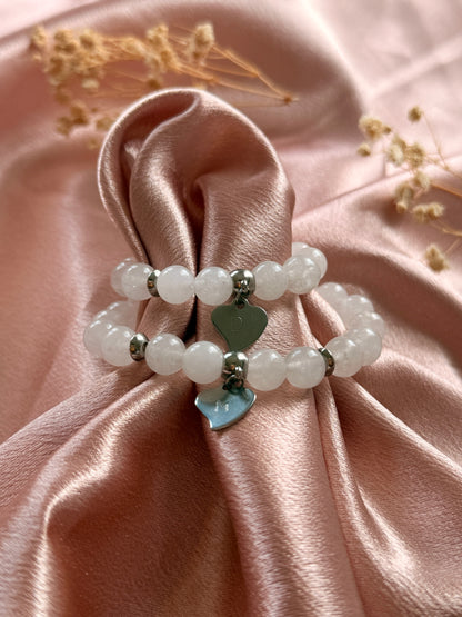 Bracelet Coralia · Quartz rose & double cœur gravé · Personnalisable initiales