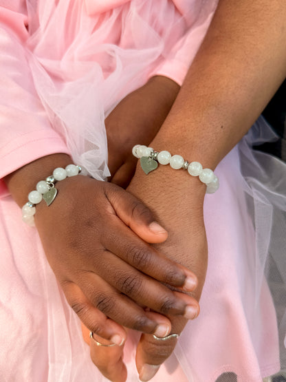 Bracelet Coralia · Quartz rose & double cœur gravé · Personnalisable initiales
